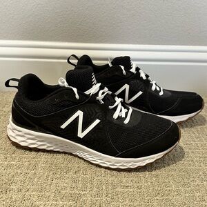 New Balance Black and White Turf Shoes